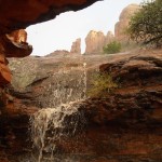 water falling into cave area in sedona red rocks